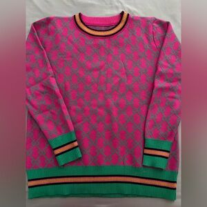 Vibrant Pink Sweater with Green Accents